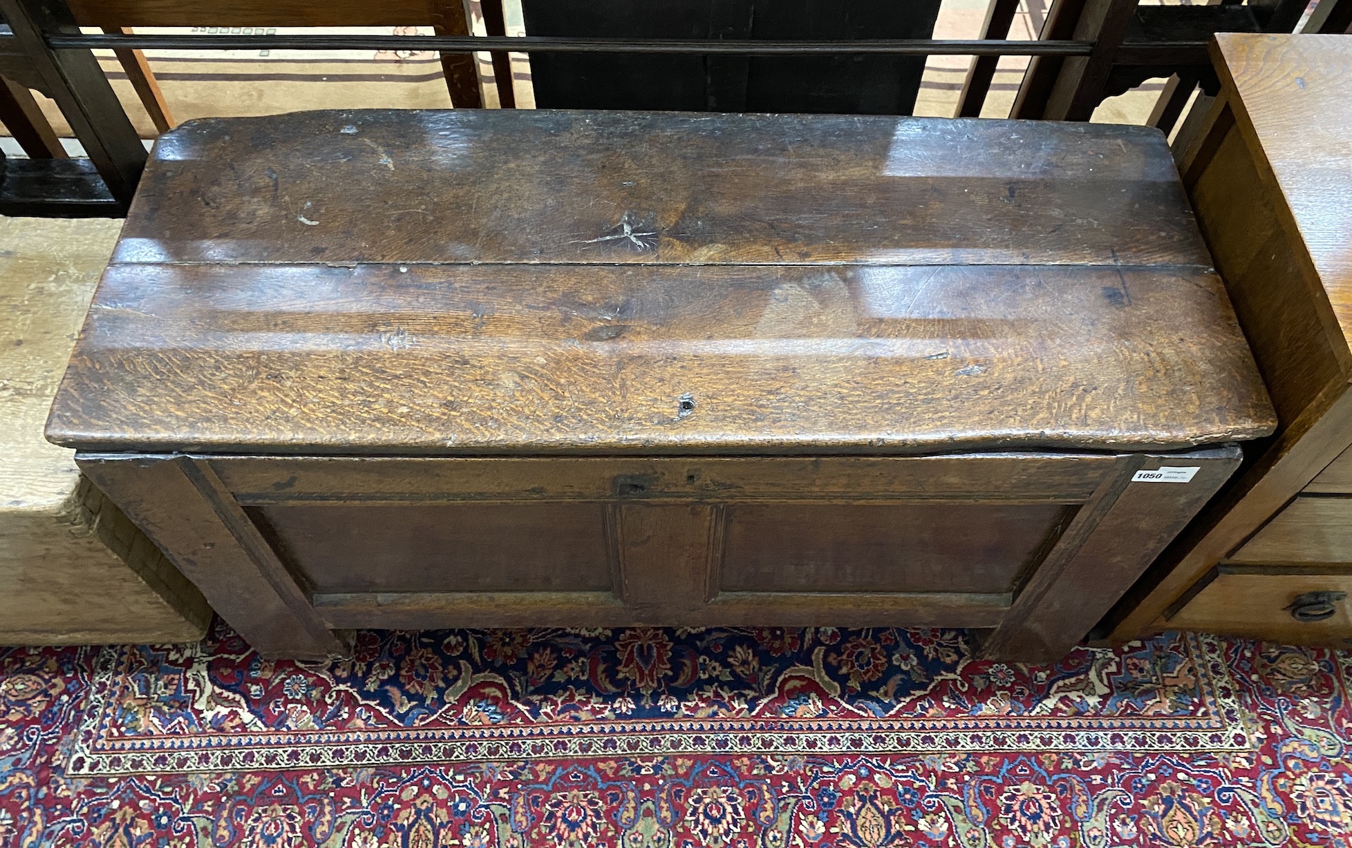 A late 17th century panelled oak coffer, length 123cm, depth 47cm, height 52cm